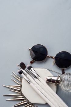 professional makeup brushes on stand on gray background and copy space cropped view. High quality photo