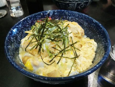 Chicken katsudon with rice place in bowl Japanese cuisine serve in restaurant