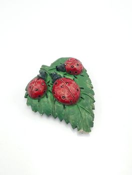 Lady bugs with leaf refrigerator magnet use to stick on metal refrigerator