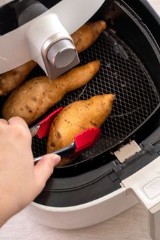 Roasted sweet potato cooked by airfryer at home. Healthy food for diet eating.