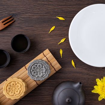 Colorful beautiful moon cake, mung bean cake, Champion Scholar Pastry cake for Mid-Autumn festival traditional gourmet dessert snack, top view, flat lay.