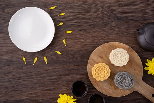 Colorful beautiful moon cake, mung bean cake, Champion Scholar Pastry cake for Mid-Autumn festival traditional gourmet dessert snack, top view, flat lay.