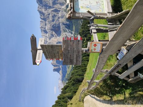 Val Gardena, Italy - 09/15/2020: Scenic alpine place with magical Dolomites mountains in background, amazing clouds and blue sky in Trentino Alto Adige region, Italy, Europe