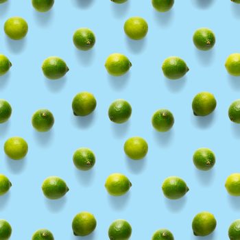 Seamless pattern with green lime. Tropical abstract Seamless pattern background. Fresh ripe Lime on the blue background.