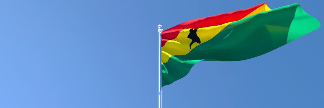 3D rendering of the national flag of Ghana waving in the wind against a blue sky