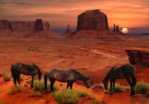 Beautiful sunset with horses in the foreground at John Ford's Point Overlook in Monument Valley Tribal Park, Arizona, USA