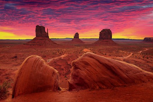 Beautiful and colorful sunrise over Monument Valley Tribal Park in Utah-Arizona border, USA