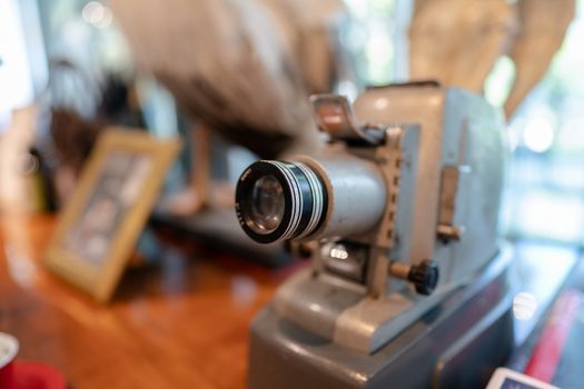 Vintage, antique large format camera in blurred background.