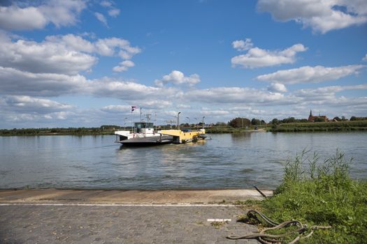BergenHolland,10-sep-2020:ferry across the river Maas from vlieringsbeek to bergen, it is used by cars and bike to enter the maasduinen nature park