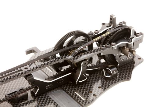 RC car chassis and parts being built to form a radio controlled race car.
