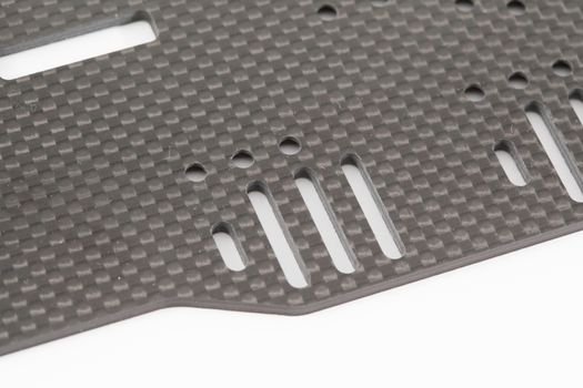 RC car chassis and parts being built to form a radio controlled race car.