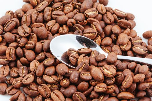 A close up shot of a pile of coffee beans