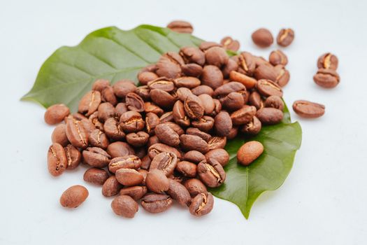 A close up shot of a pile of coffee beans