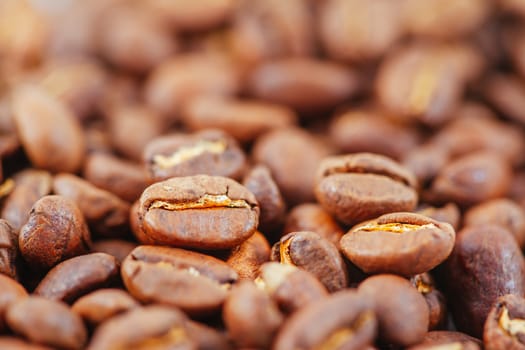 A close up shot of a pile of coffee beans