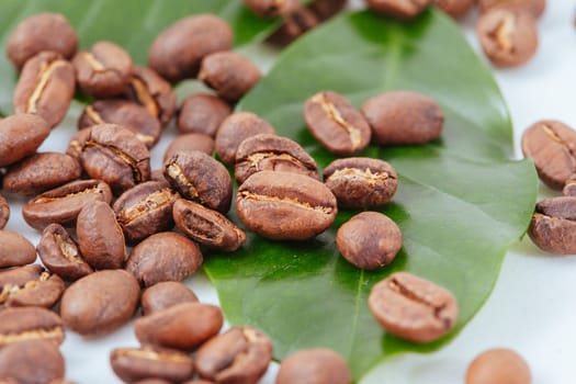 A close up shot of a pile of coffee beans