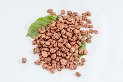 A close up shot of a pile of coffee beans