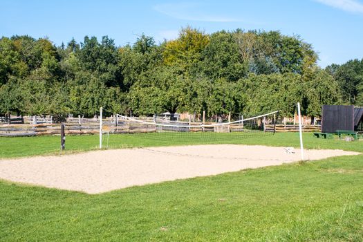 Empty playground for badminton and volleyball on a summer sunny day.