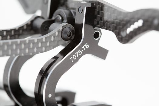 RC car chassis and parts being built to form a radio controlled race car.