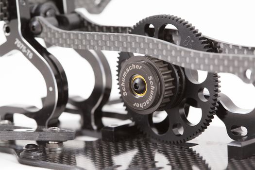 RC car chassis and parts being built to form a radio controlled race car.
