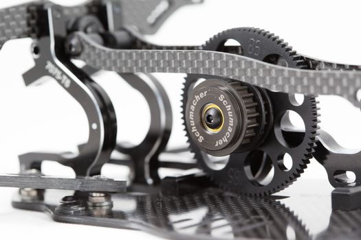 RC car chassis and parts being built to form a radio controlled race car.