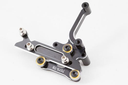 RC car chassis and parts being built to form a radio controlled race car.