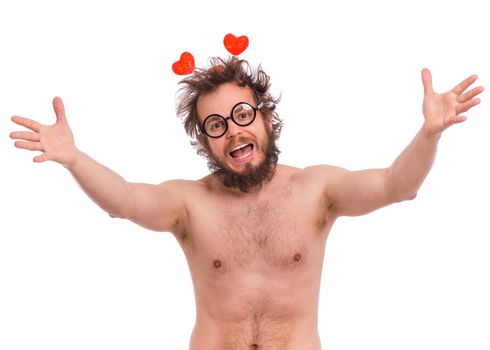 Happy Valentines Day. Crazy bearded Man with funny Curly Hair in eye Glasses. Happy and silly guy in Love, isolated on white background. Portrait of Cheerful man looking at camera.