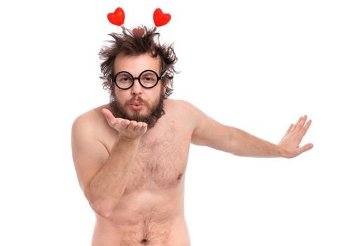 Happy Valentines Day. Crazy bearded Man with funny Haircut in eye Glasses. Silly guy in Love, isolated on white background. Cheerful naked man in Headband with hearts, sending air kiss at camera.