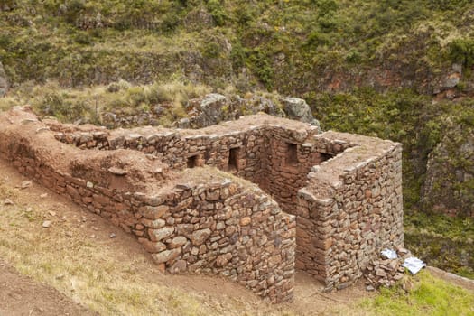 Pisac, Peru - April 4, 2014: Archaeological Park of Pisac, ruins and constructions of the ancient Inca city, near the Vilcanota river valley, Peru.