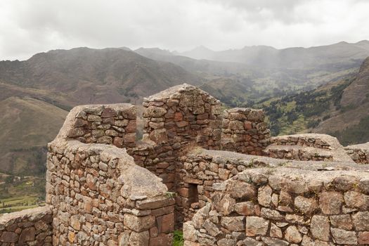 Pisac, Peru - April 4, 2014: Archaeological Park of Pisac, ruins and constructions of the ancient Inca city, near the Vilcanota river valley, Peru.