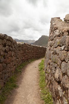 Pisac, Peru - April 4, 2014: Archaeological Park of Pisac, ruins and constructions of the ancient Inca city, near the Vilcanota river valley, Peru.