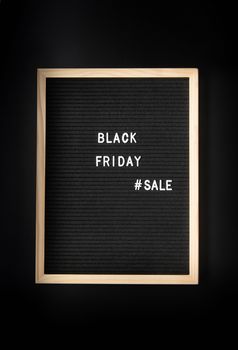 Black friday, seasonal sale concept. Text black friday sale on black letter board on black background