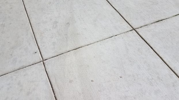 grey rough dirty cement or ground or pavement or concrete with lines