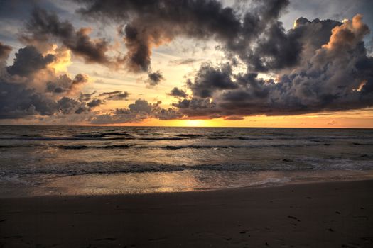 Sunset over the White sand at Delnor Wiggins State Park in Naples, Florida.