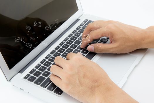 Hands of businessman using a computer keyboard of sending email, communication concept.