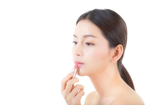 Lipstick makeup asian woman with lip balm care. Beauty Asian girl 
on lips with happy. cosmetics beauty concept.