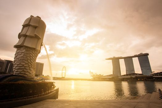 MERLION, SINGAPORE - August 27, 2017 : Landscape view of sunrise at Singapore landmark of Merlion and background with Marina Bay sands on August 27, 2017 Merlion, Singapore
