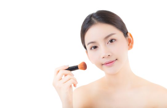 Beauty asian woman applying make up with brush isolated on white background, health clean skincare cosmetics concept.
