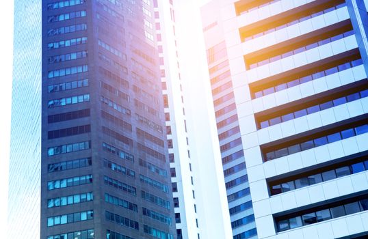 Modern business skyscrapers with high buildings in blue tone, architecture business concept.