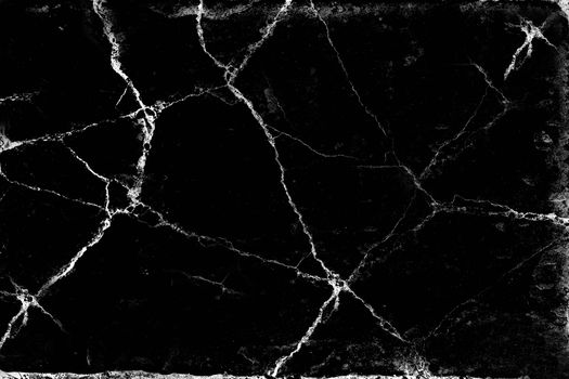 Black aged wall surface with large white cracks .Texture or background.