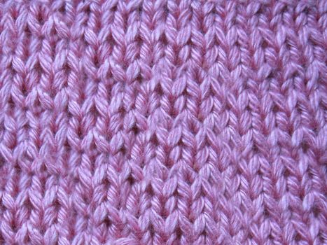 Knitted wool sweater handmade in pink with netting