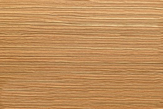 Dense fabric with striped rough textured surface in a brown colour