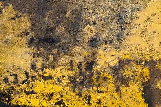 Rusty metal surface with peeling yellow paint.Background.Texture