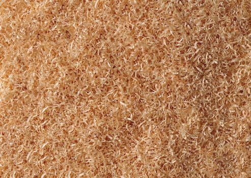 Large amount of fine sawdust close-up waste production