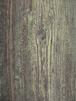 Old grey surface of wooden village fence with cracks