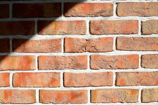 Brick wall of decorative brick orange.Texture.Background