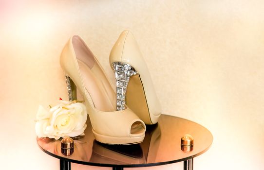 Wedding shoes with high heels decorated with precious stones