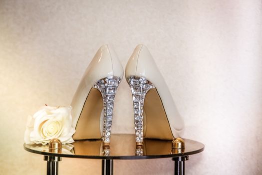 Wedding shoes with high heels decorated with precious stones