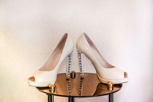 Wedding shoes with high heels decorated with diamonds