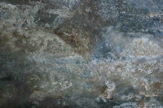 Multicolor rough structure of the surface of the granite .Texture.Background