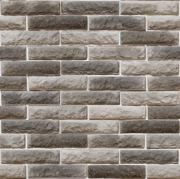 Decorative overlay stone in the form of gray brick .Texture or background.